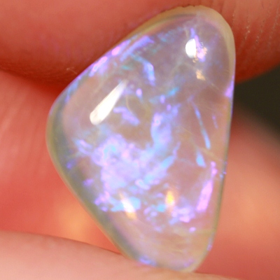 SOLID CRYSTAL OPAL Transparent with rich purple throughout